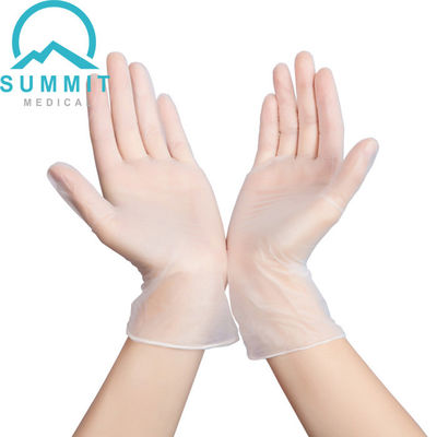 Saupoudrez le latex jetable clair libre de gants d'examen de PVC libre